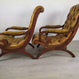 Pair of padded Chesterfield armchairs