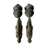 Pair of bronze coats