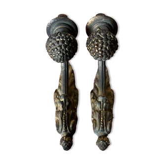 Pair of bronze coats