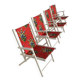 4 vintage garden chairs from the 70s with original floral fabric.