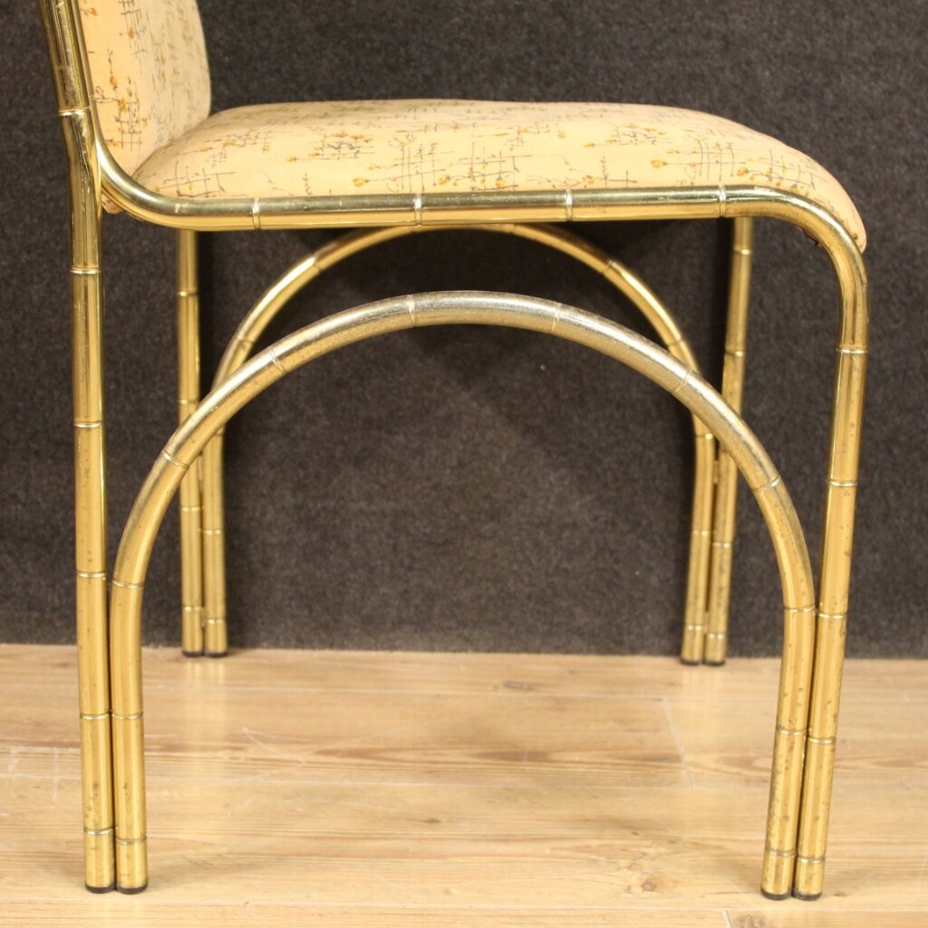 Six Italian design chairs in golden metal