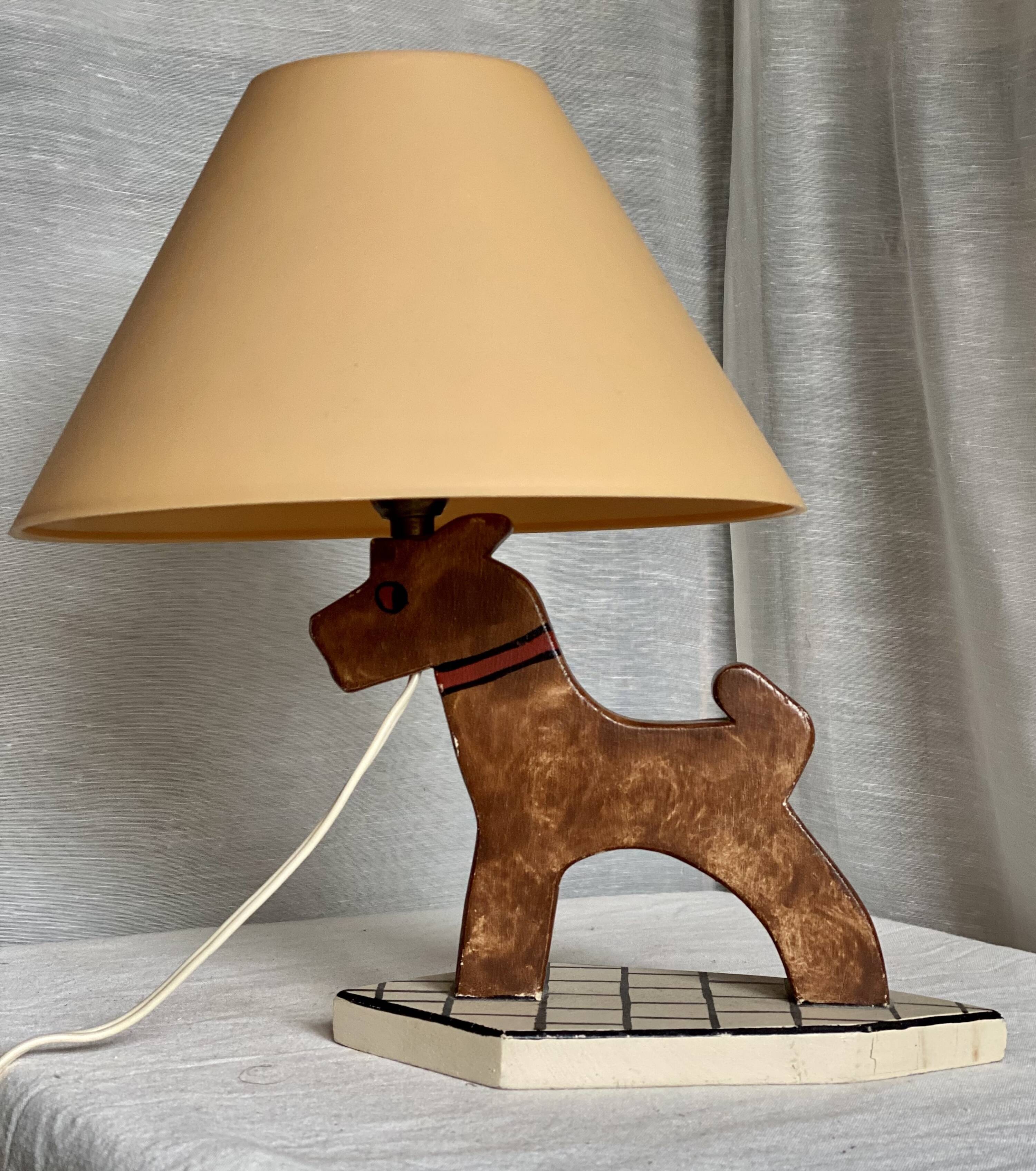 Vintage 1970s polychrome wooden lamp in the shape of a dog.