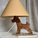 Vintage 1970s polychrome wooden lamp in the shape of a dog.