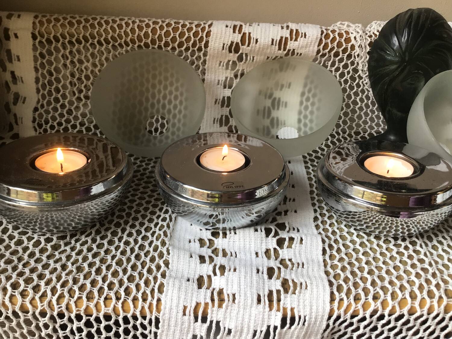 Trio of designer tealight holders