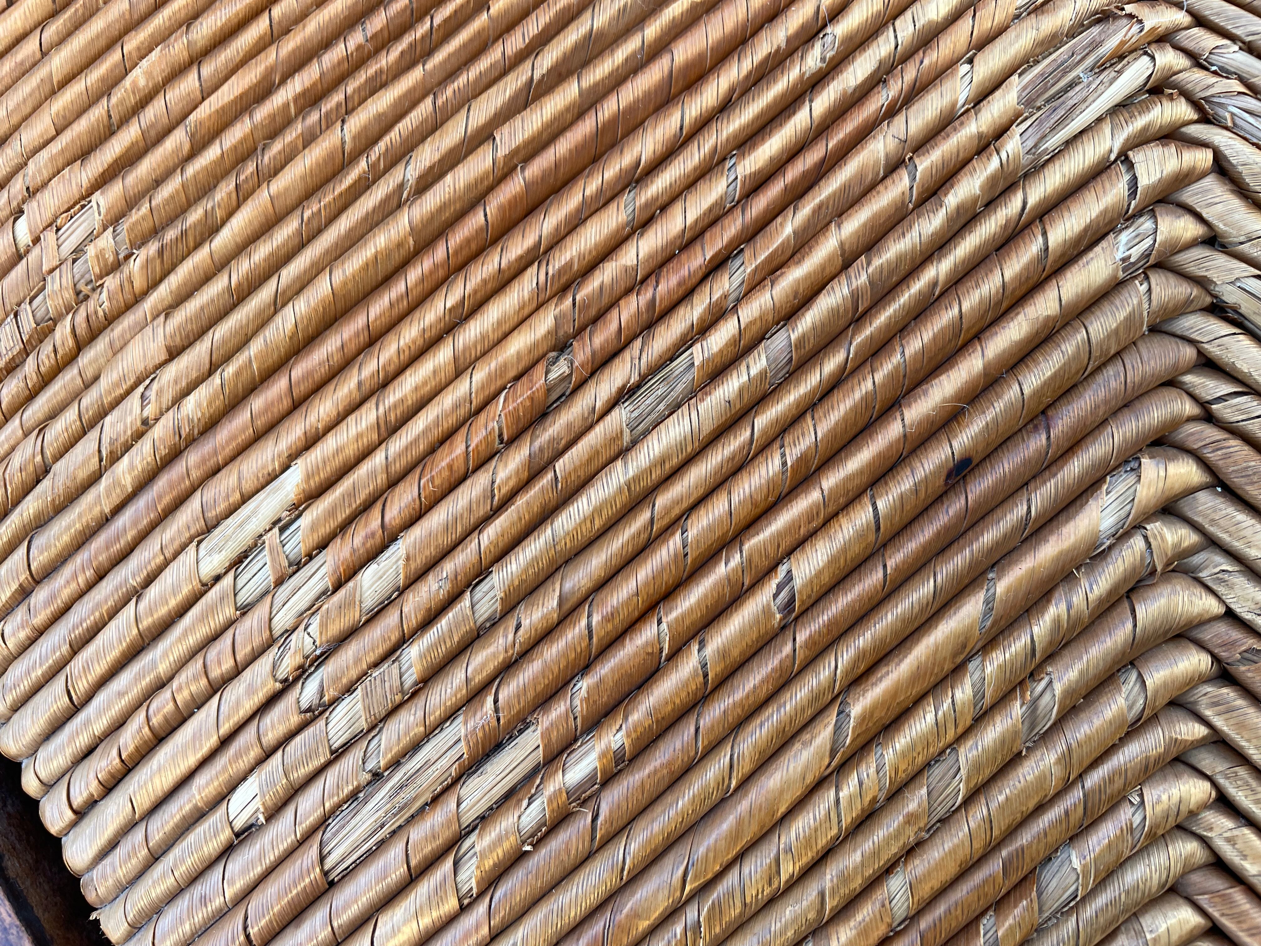 Vintage armchair in straw and brutalist wood