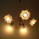 Vintage chandelier with roses in glass paste
