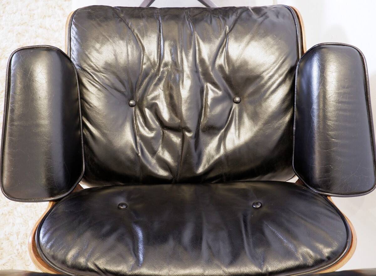Mid-Century armchair and footrest by Charles & Ray Eames for Herman Miller