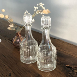 2 small bottles / glass bottles with caps