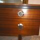 Avalon sideboard in brown teak veneer, chrome handles and wooden legs, 1960s.
