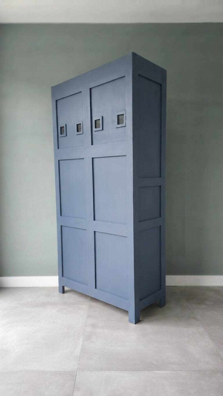 Vintage grey wooden wardrobe from 1914.