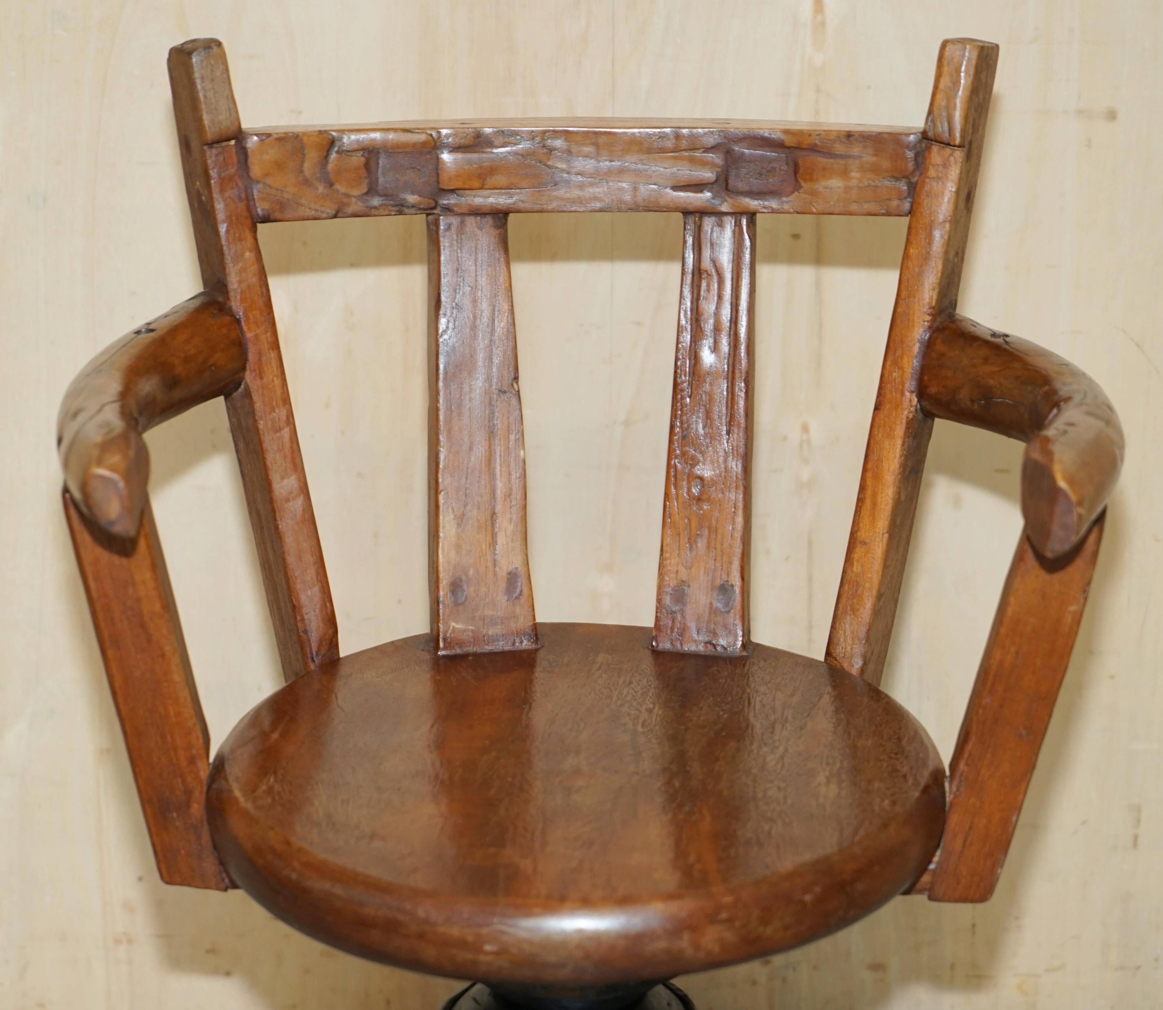 Antique captain's swivel chair on a draft horse wheel from around 1760.