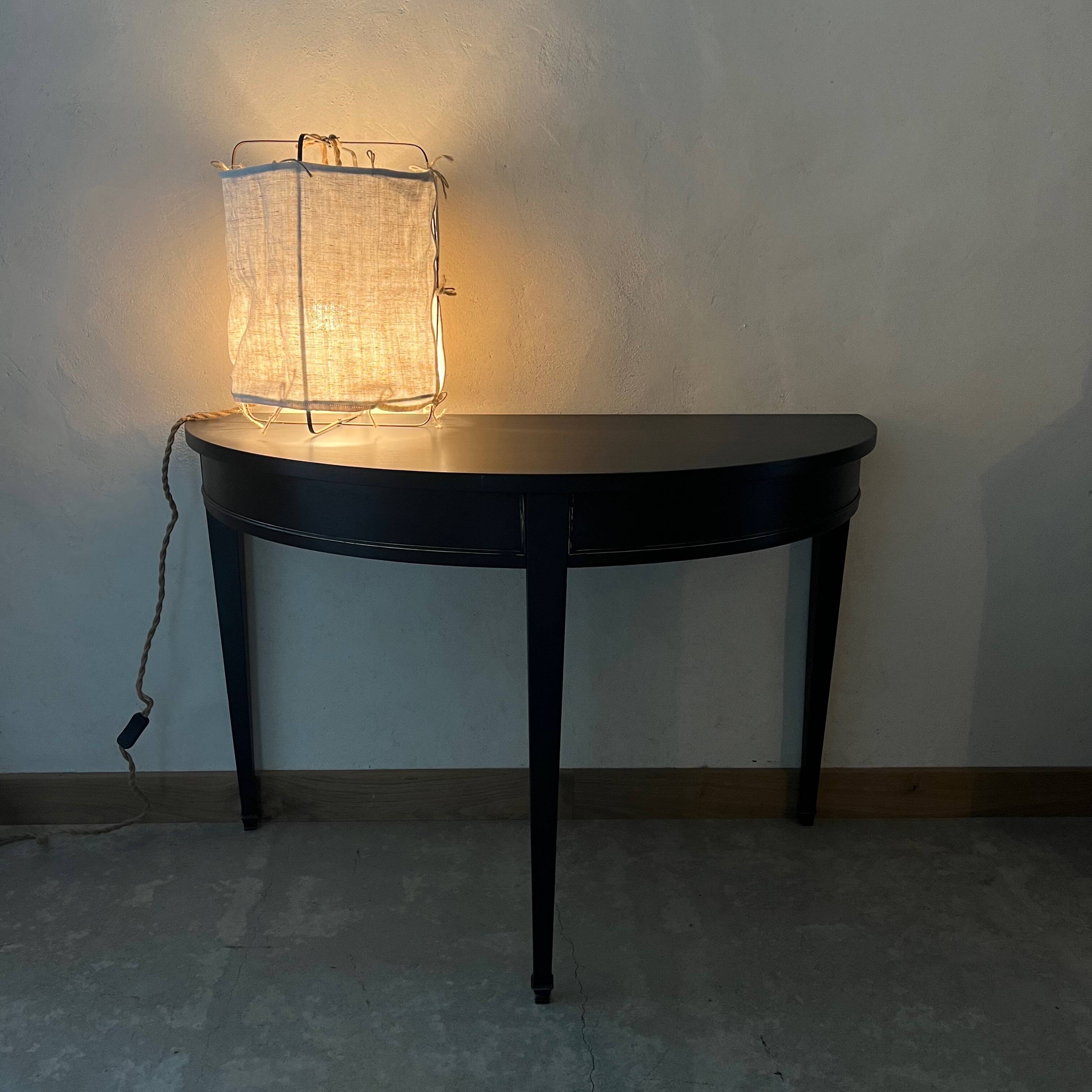 Black half-moon console
