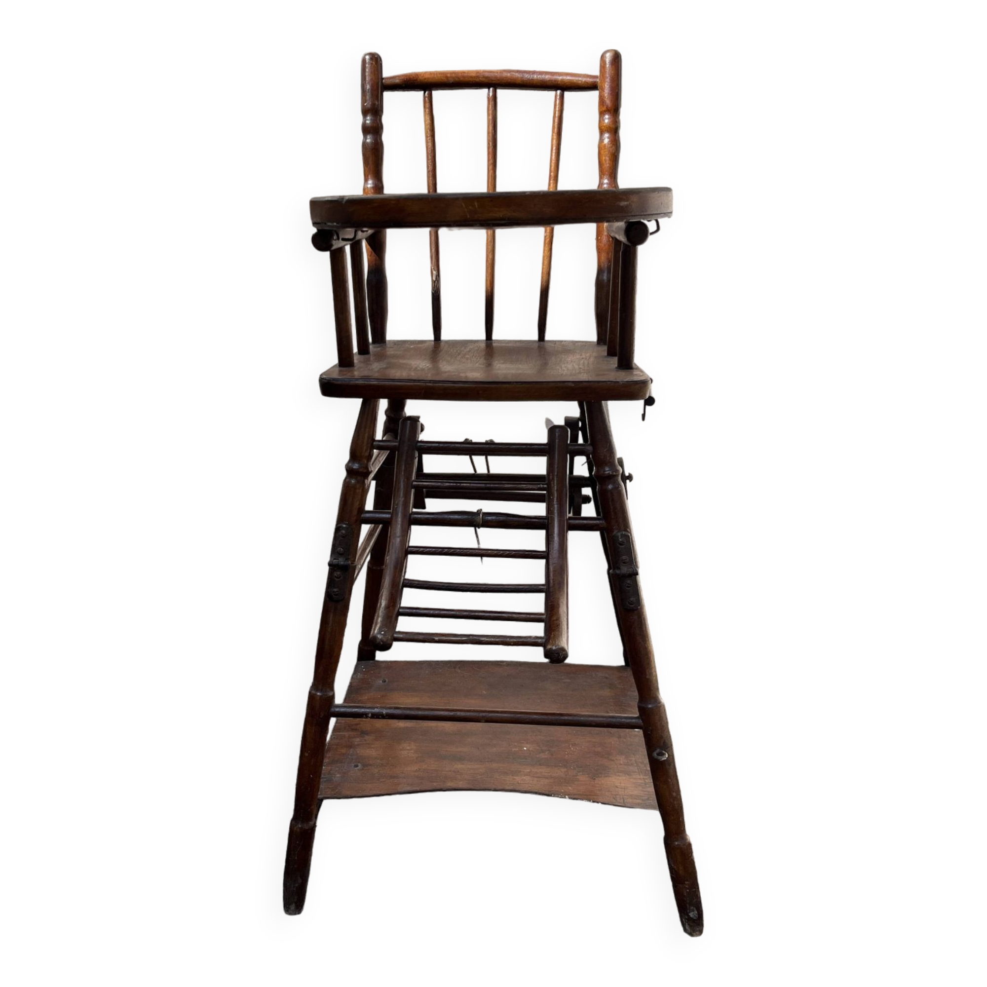 Wooden baby high chair convertible into a small desk from the 1950s