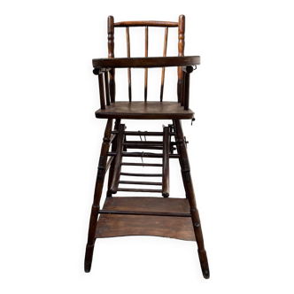 Wooden baby high chair convertible into a small desk from the 1950s