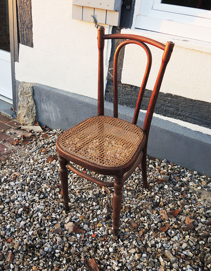 Old bistro chair in curved wood