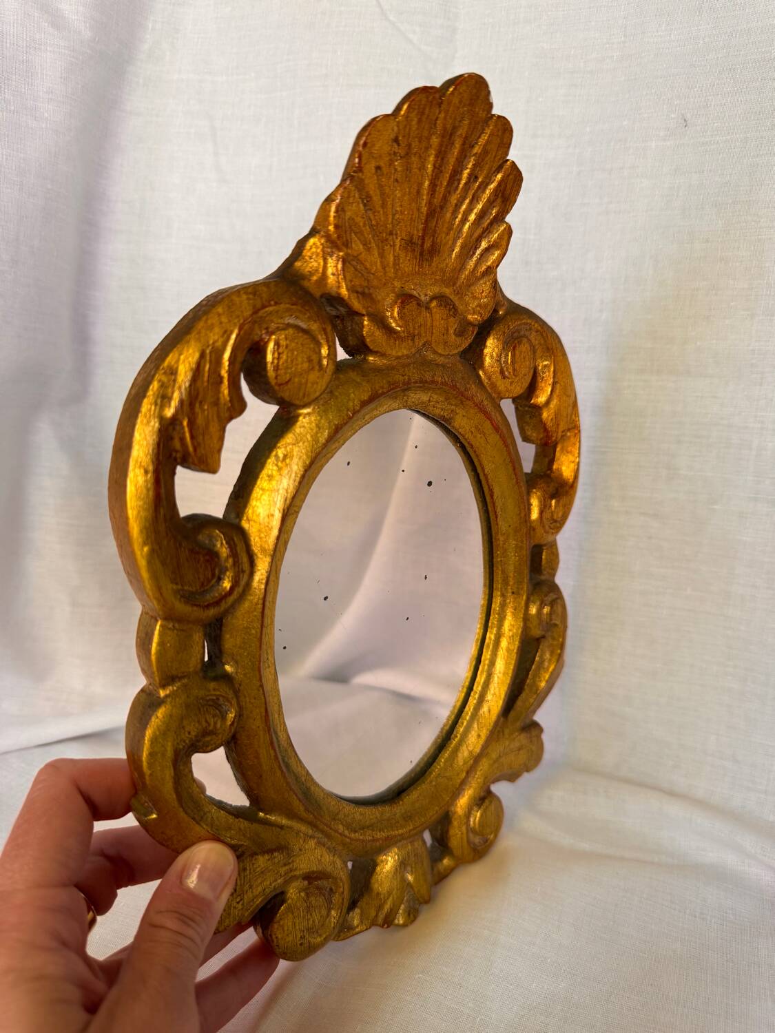 Miroir vintage en bois doré