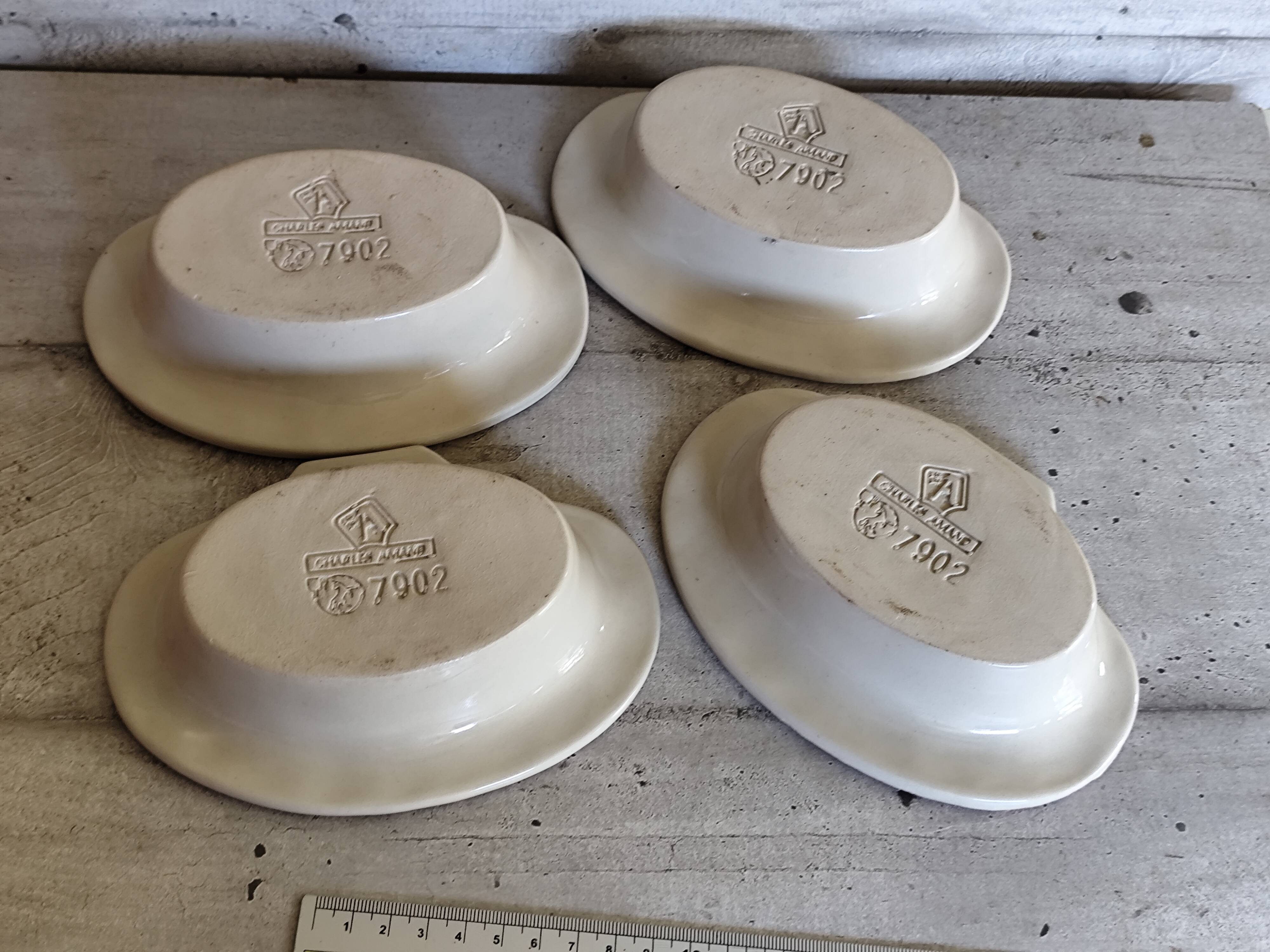 Set of 4 Charles Amand ceramic ramekins