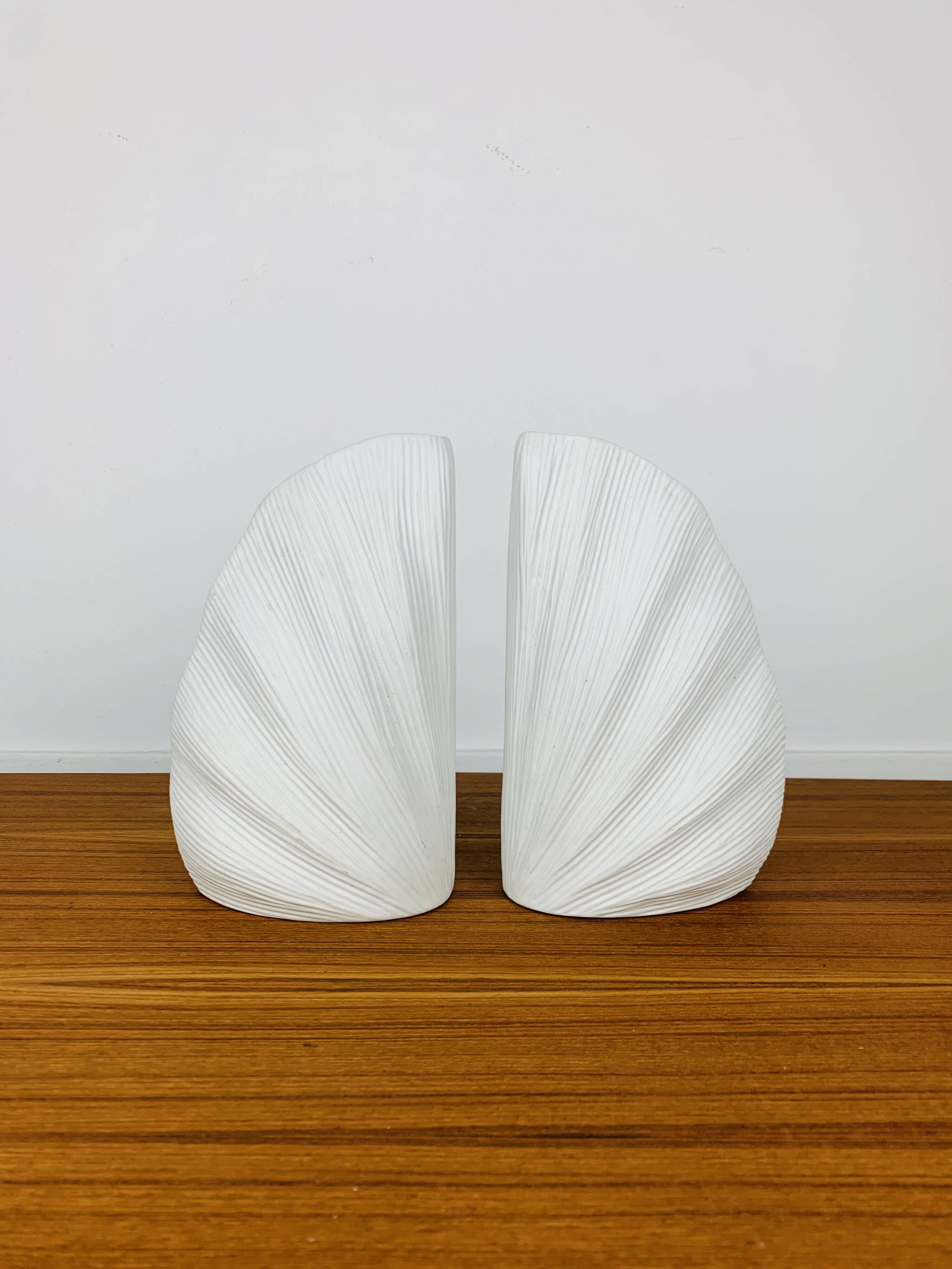 Pair of white ceramic coral vases, bookends