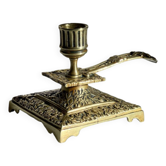Patterned solid bronze hand candle holder