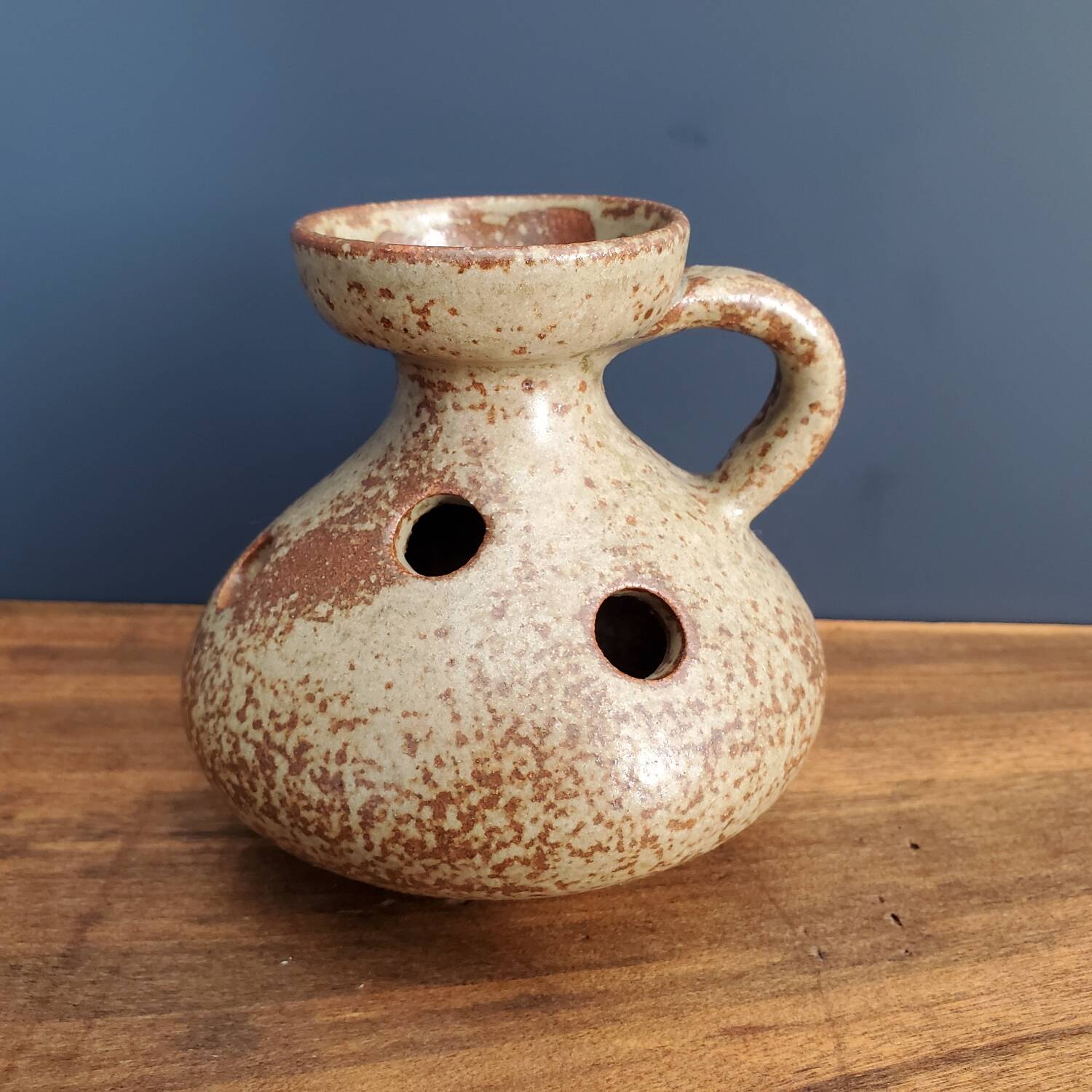 Stoneware cellar rat candle holder
