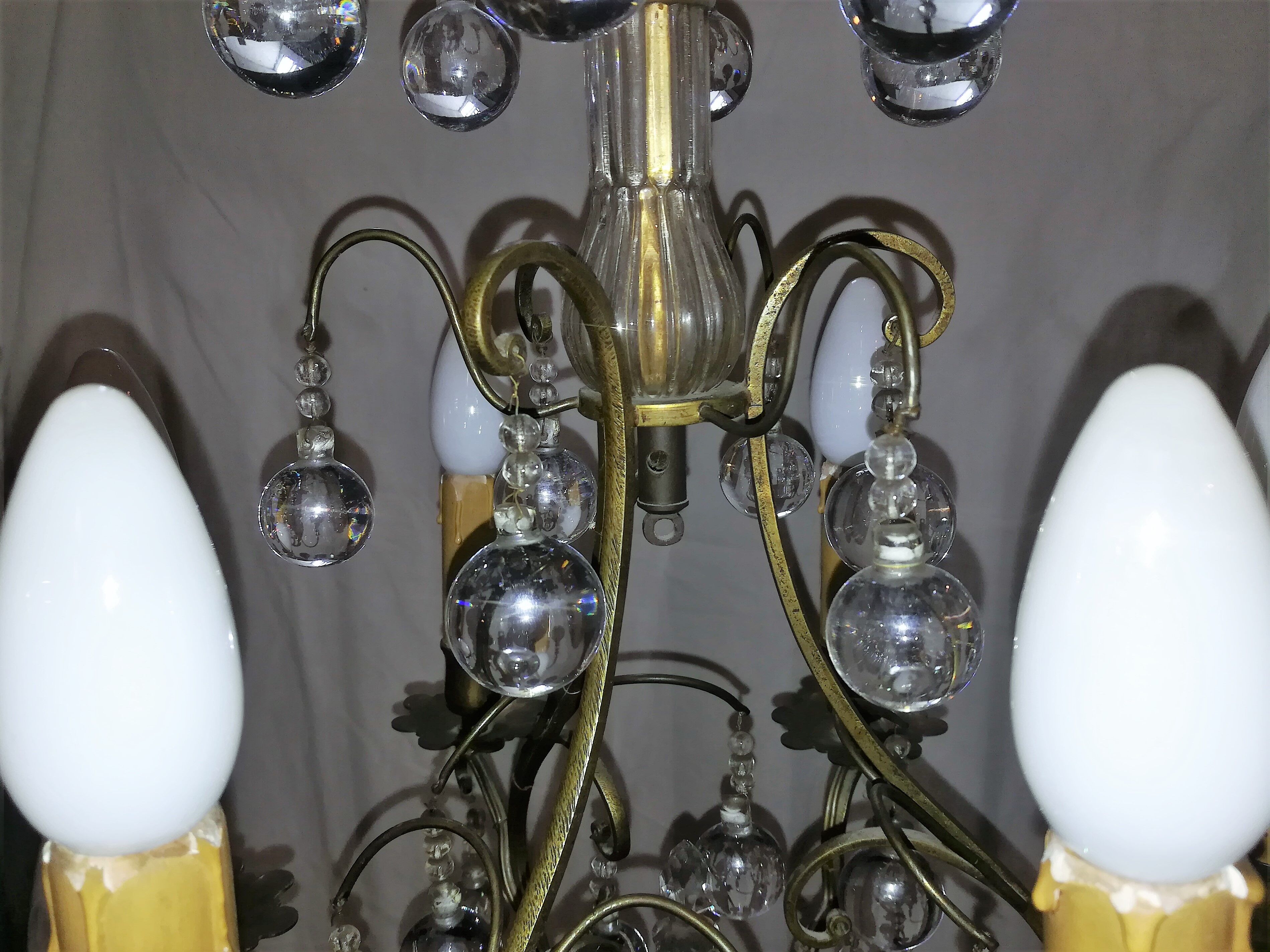 Bronze chandelier and stamps balls