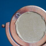 Round mirror psyche of wooden table