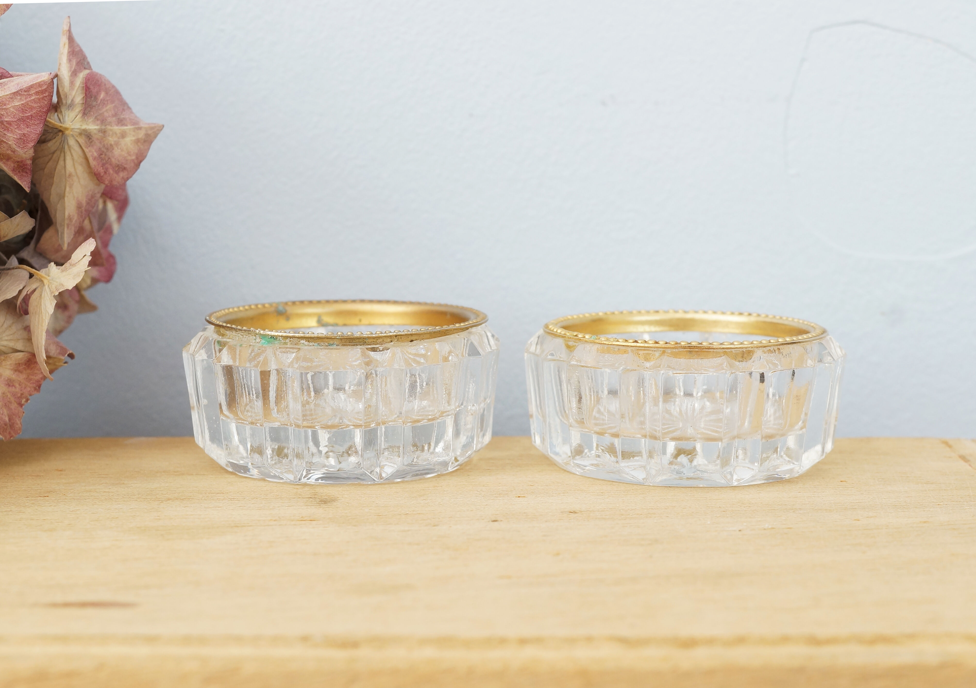 Set of two crystal buds with brass border, vintage