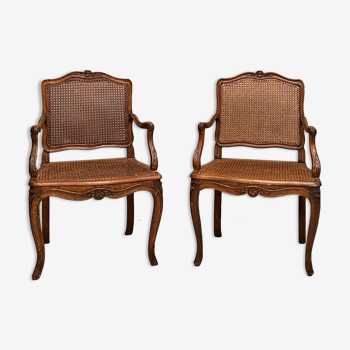Pair of cannate armchairs moldings and sculpts of the regency era