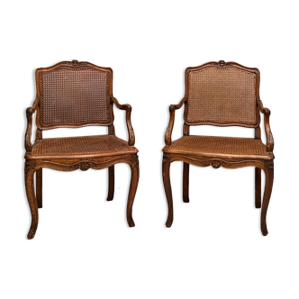 Pair of cannate armchairs moldings and sculpts of the regency era