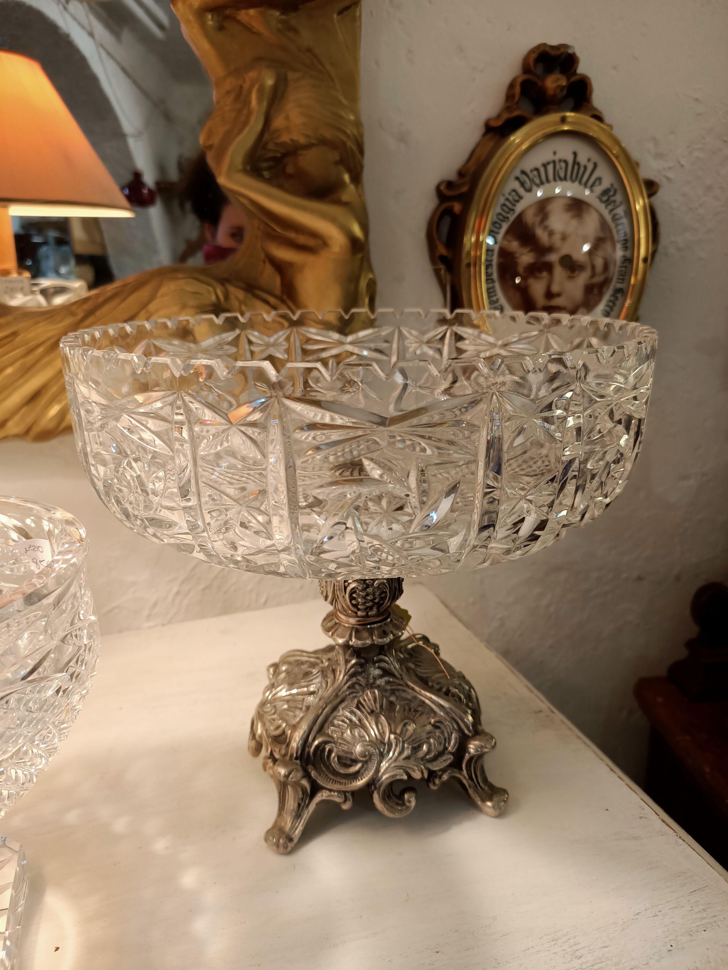 Crystal cut, silver metal.