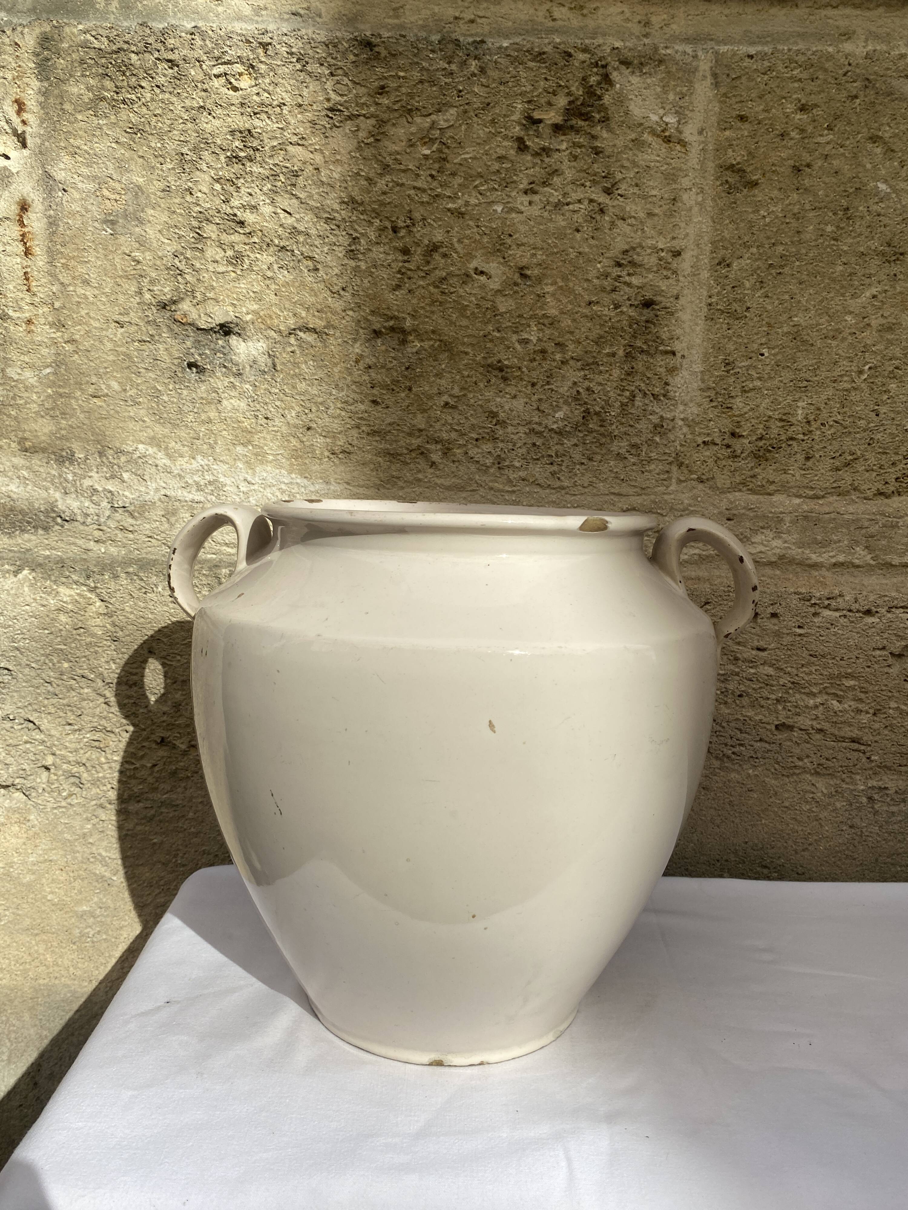 Enamelled terracotta pot