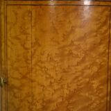 Empire gueridon in mottled maple with a blue stone top, 19th century.