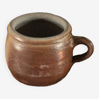 Round terracotta milk jug with handle