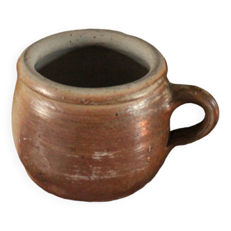 Round terracotta milk jug with handle