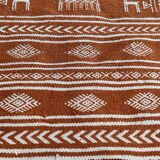 White and brown kilim carpet with gazelle patterns
