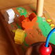Game of awakening louping the hen and its 3 wooden chicks
