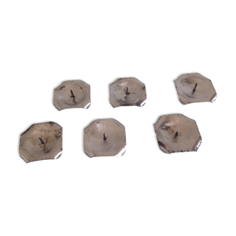 Brushed metal candle holders