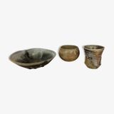 Three stoneware empty pockets with blue drips