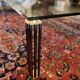 Vintage Hollywood coffee table - Glass, brass, and fluted legs.