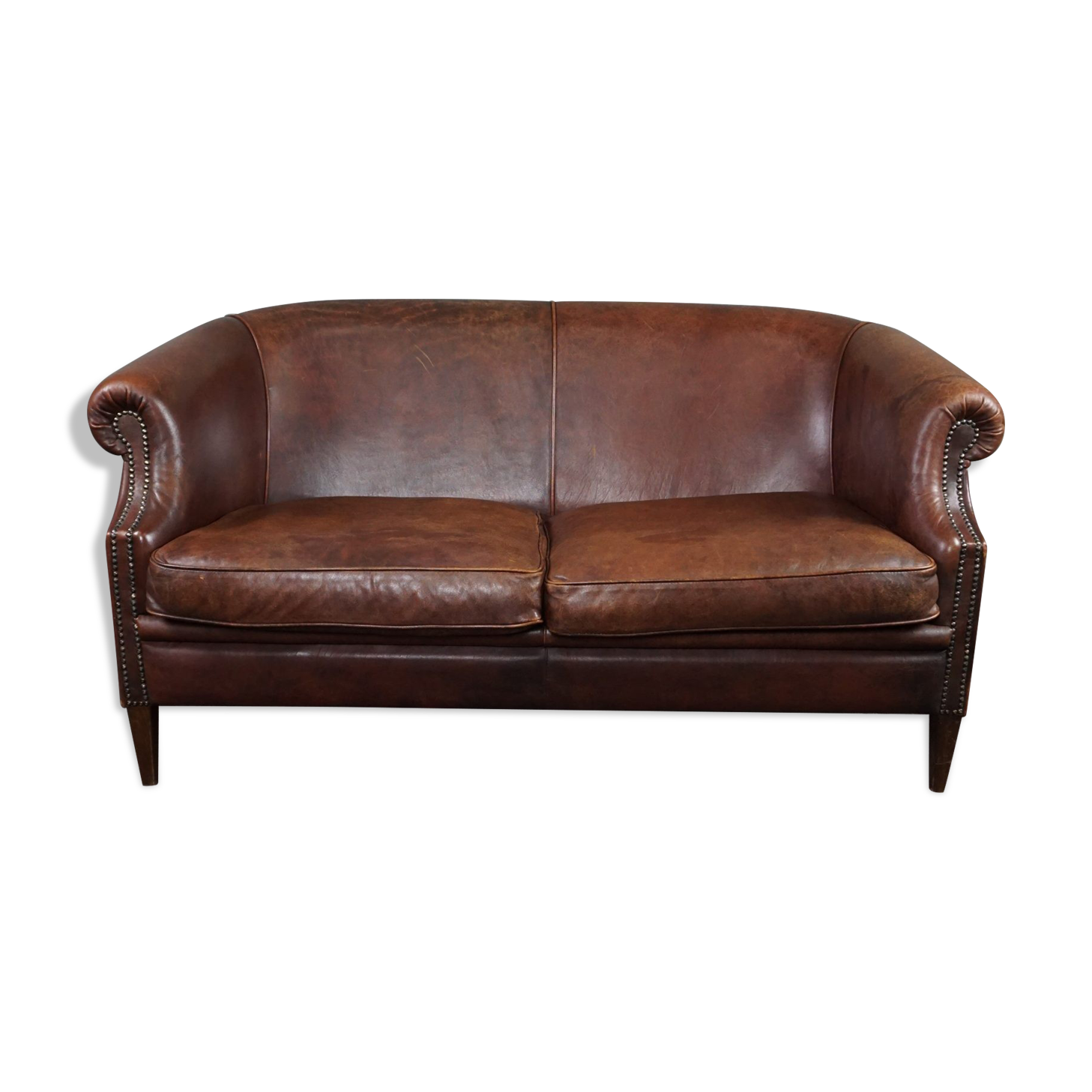 2-seater sofa in sheepskin decorative nails