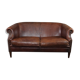 2-seater sofa in sheepskin decorative nails