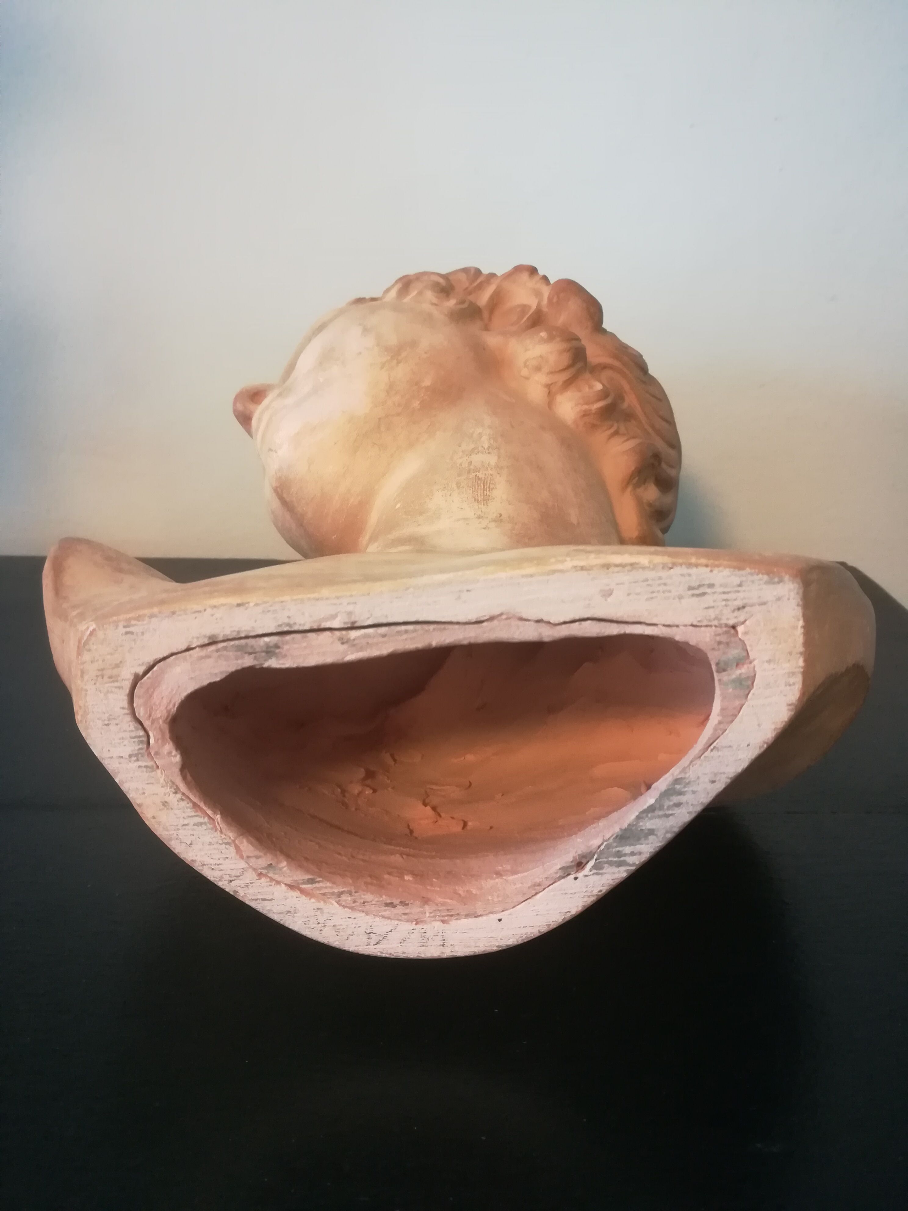 Children's bust in terracotta