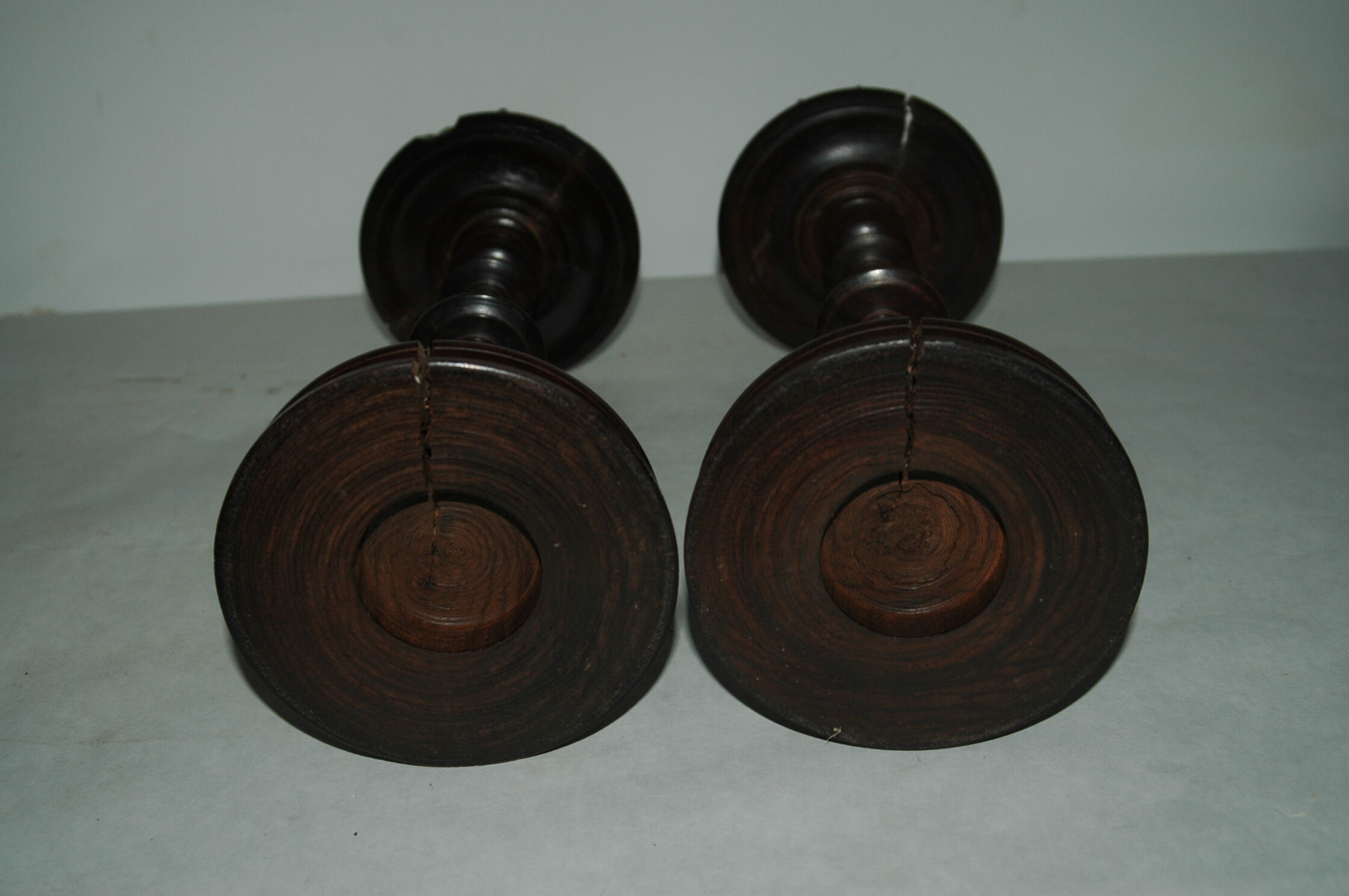 Pair of mahogany turned wood candlesticks