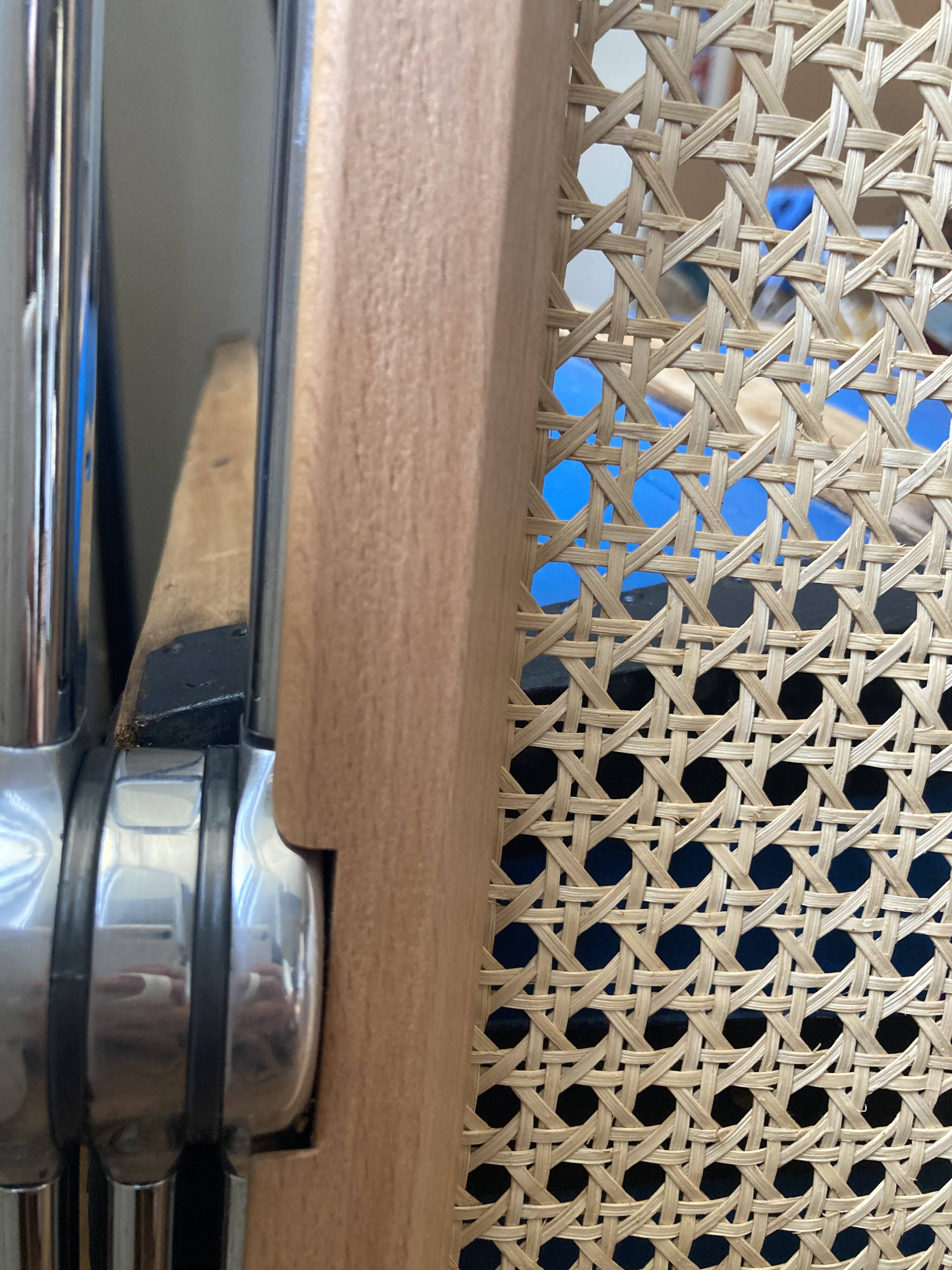 Plia chairs by Castelli in wood and cane.