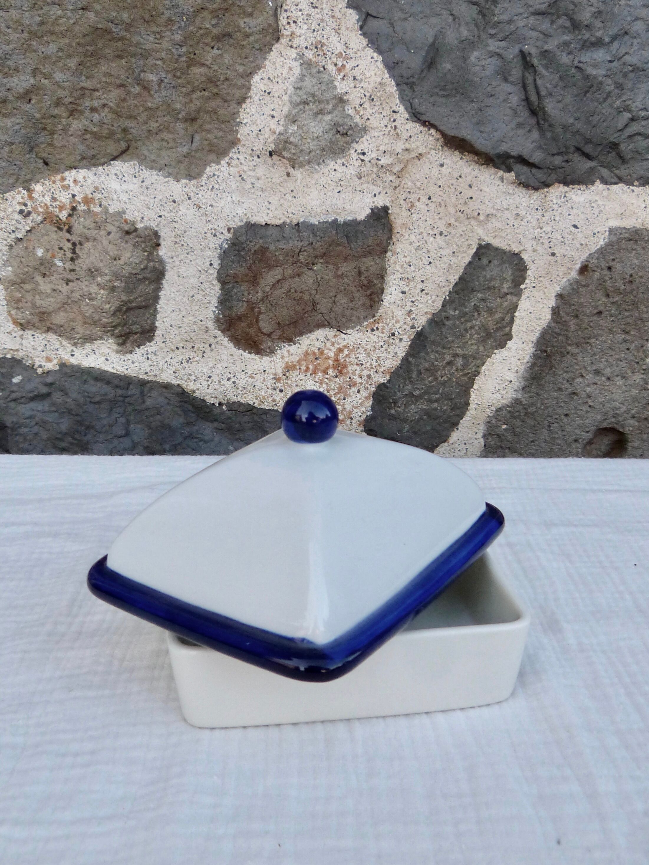 White and blue ceramic butter dish