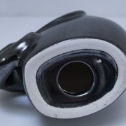 Two iridescent black and white ceramic elephants design