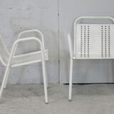 Pair of honeycomb steel armchairs. France, circa 1950.