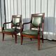 Paire de fauteuils de style Empire en acajou et cuir vert