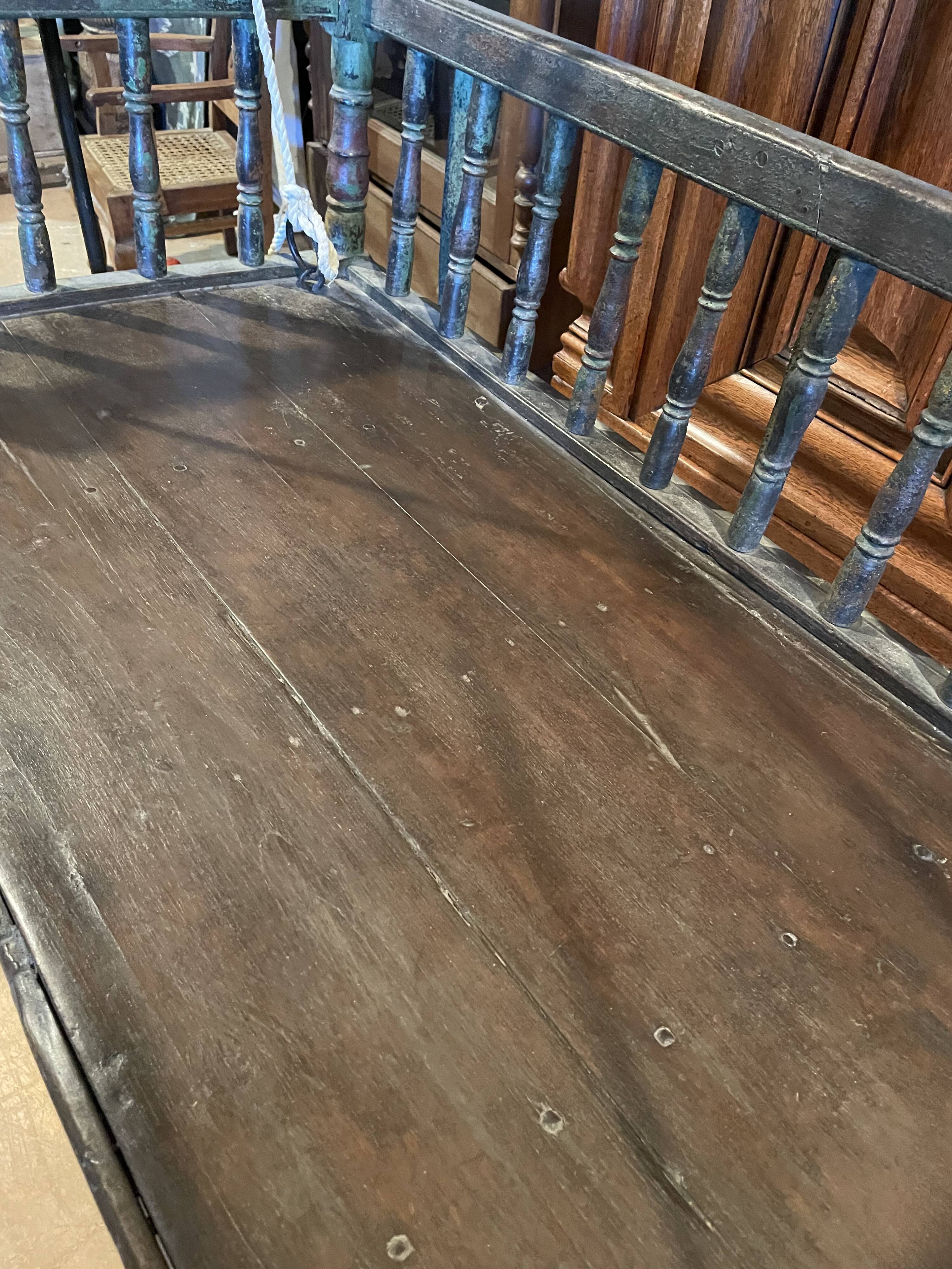 Black lacquered teak rocking chair