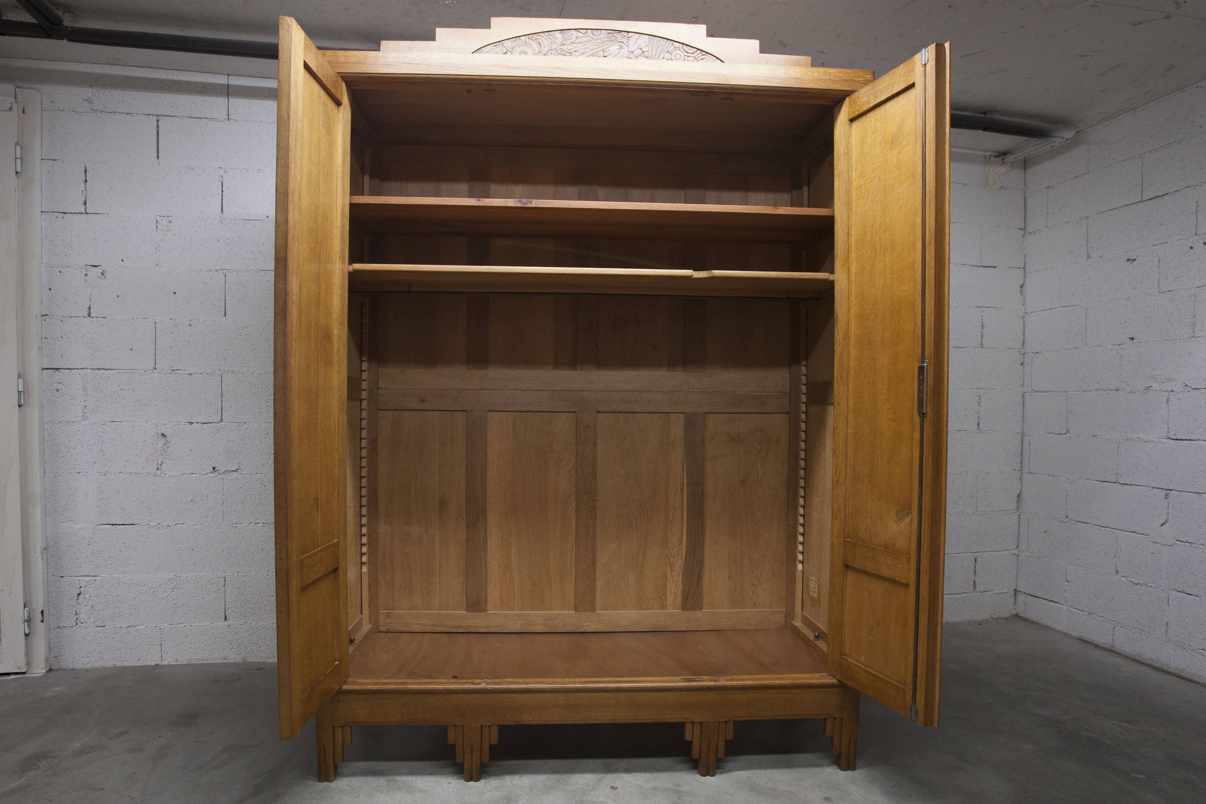 Art Deco carved oak wardrobe - Flemish workshop circa 1930